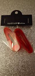 Duo de pinces à cheveux – Rouge translucide pailleté